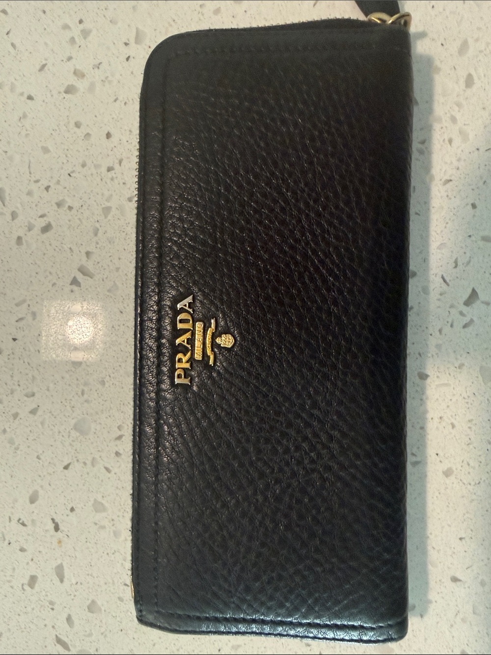 Prada Black Pebbled Leather Zip wallet with Gold Hardware